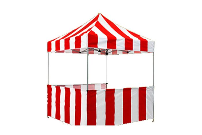 A red and white striped tent with a clear top.